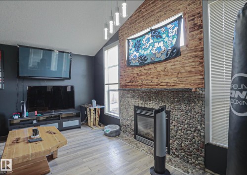 4506 154 Avenue Nw, Edmonton, AB - Indoor Photo Showing Other Room With Fireplace