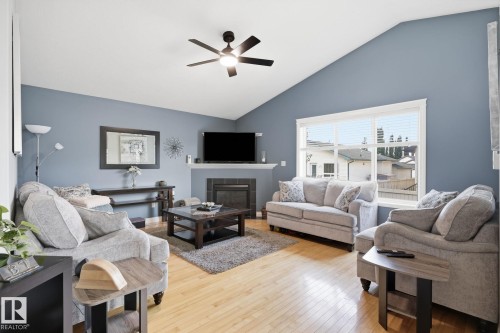 66 Willowby Close, Stony Plain, AB - Indoor Photo Showing Living Room With Fireplace