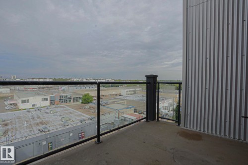 Balcony with concrete flooring and glass panel railing - #607 10518 113 St Nw Nw, Edmonton, AB - Outdoor With Balcony With View