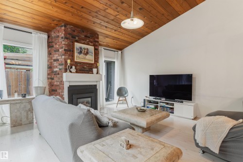 190 Westridge Road Nw, Edmonton, AB - Indoor Photo Showing Living Room With Fireplace