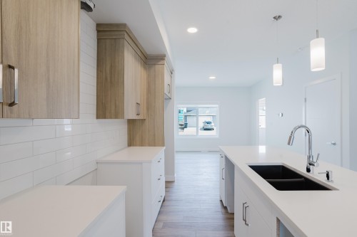 307 Brae Way, Leduc, AB - Indoor Photo Showing Kitchen With Double Sink