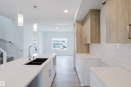 307 Brae Way, Leduc, AB - Indoor Photo Showing Kitchen With Double Sink