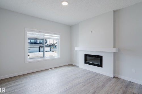 307 Brae Way, Leduc, AB - Indoor Photo Showing Living Room With Fireplace