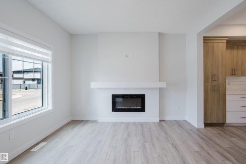 307 Brae Way, Leduc, AB - Indoor Photo Showing Living Room With Fireplace
