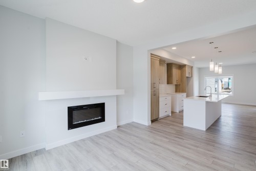 307 Brae Way, Leduc, AB - Indoor Photo Showing Living Room With Fireplace