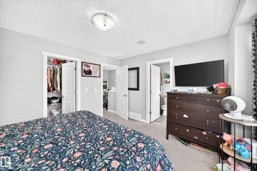 Recessed lighting, white trim, and light grey walls - 1929 24 Street Nw, Edmonton, AB - Indoor Photo Showing Bedroom