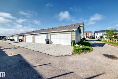 Attached garages with concrete driveways - 1929 24 Street Nw, Edmonton, AB - Outdoor