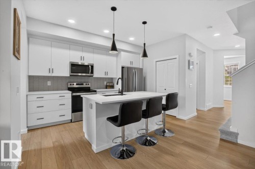 22830 82A Avenue Nw, Edmonton, AB - Indoor Photo Showing Kitchen With Upgraded Kitchen