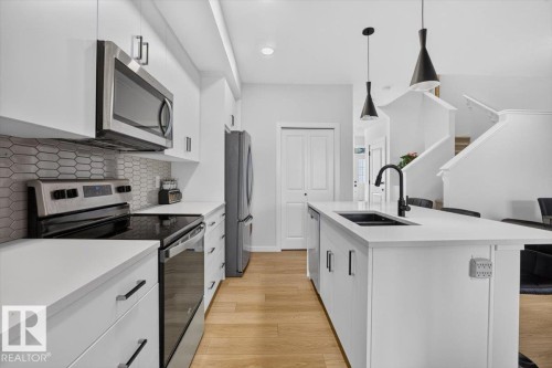 22830 82A Avenue Nw, Edmonton, AB - Indoor Photo Showing Kitchen With Double Sink With Upgraded Kitchen