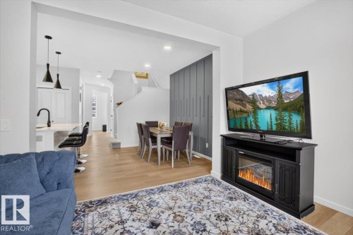 22830 82A Avenue Nw, Edmonton, AB - Indoor Photo Showing Living Room With Fireplace