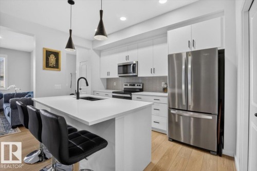 22830 82A Avenue Nw, Edmonton, AB - Indoor Photo Showing Kitchen With Upgraded Kitchen