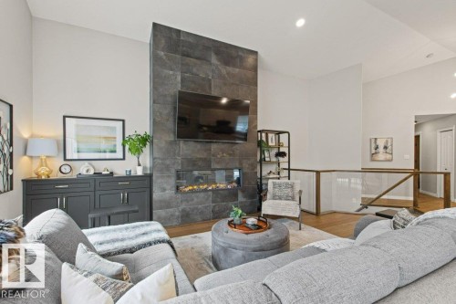 501 Byrne Crescent Sw, Edmonton, AB - Indoor Photo Showing Living Room With Fireplace
