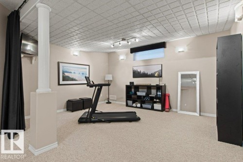 501 Byrne Crescent Sw, Edmonton, AB - Indoor Photo Showing Gym Room