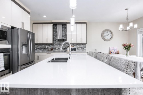 241 Westbrook Wynd, Fort Saskatchewan, AB - Indoor Photo Showing Kitchen With Double Sink With Upgraded Kitchen