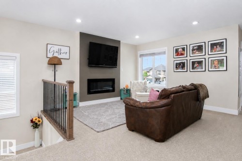 241 Westbrook Wynd, Fort Saskatchewan, AB - Indoor Photo Showing Other Room With Fireplace