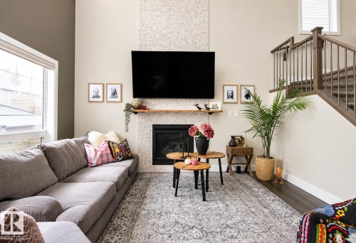 241 Westbrook Wynd, Fort Saskatchewan, AB - Indoor Photo Showing Living Room With Fireplace