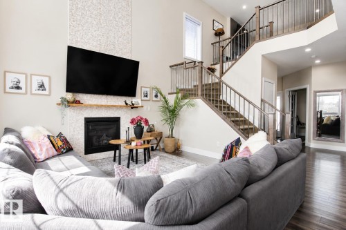 241 Westbrook Wynd, Fort Saskatchewan, AB - Indoor Photo Showing Living Room With Fireplace