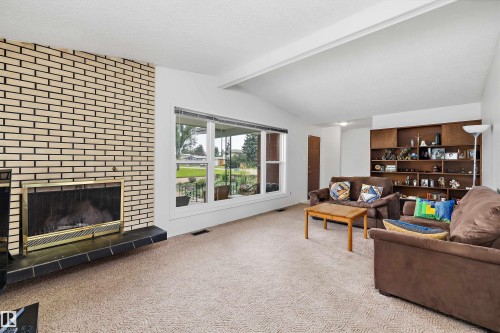 3616 109A Street Nw, Edmonton, AB - Indoor Photo Showing Living Room With Fireplace