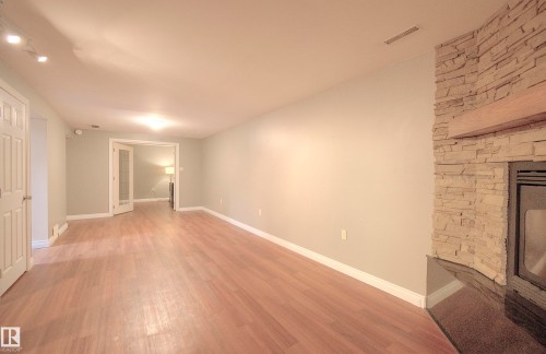 43 Westlake Drive, Spruce Grove, AB - Indoor Photo Showing Other Room With Fireplace