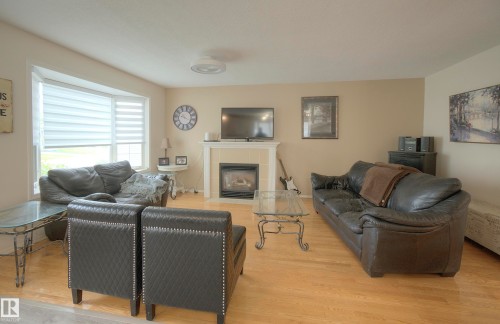 43 Westlake Drive, Spruce Grove, AB - Indoor Photo Showing Living Room With Fireplace