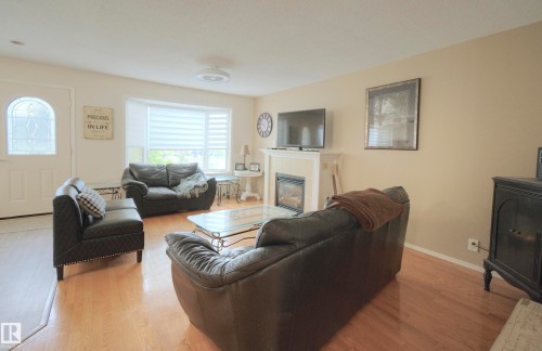 43 Westlake Drive, Spruce Grove, AB - Indoor Photo Showing Living Room With Fireplace