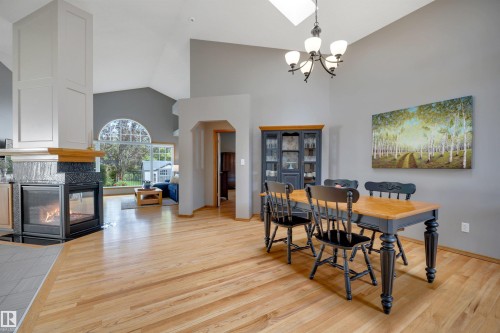 341 Burton Road Nw, Edmonton, AB - Indoor Photo Showing Dining Room With Fireplace