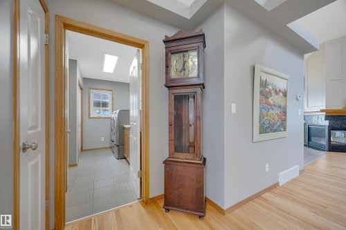 341 Burton Road Nw, Edmonton, AB - Indoor Photo Showing Other Room With Fireplace