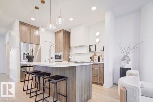 4550 Warbler Loop Nw, Edmonton, AB - Indoor Photo Showing Kitchen With Upgraded Kitchen