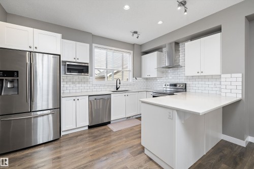 8412 24 Avenue Sw, Edmonton, AB - Indoor Photo Showing Kitchen With Stainless Steel Kitchen With Upgraded Kitchen