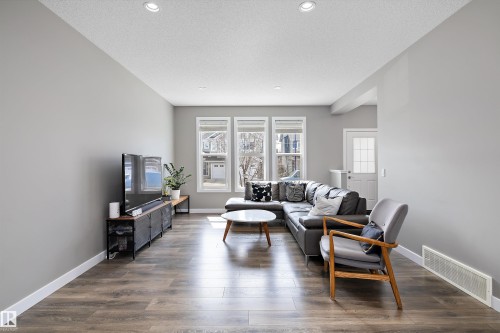8412 24 Avenue Sw, Edmonton, AB - Indoor Photo Showing Living Room