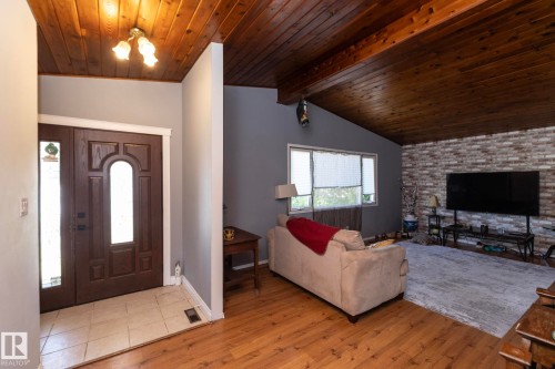 3608 44 Street, Leduc, AB - Indoor Photo Showing Living Room With Fireplace