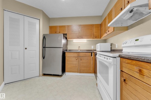#608 10149 Saskatchewan Dr Nw, Edmonton, AB - Indoor Photo Showing Kitchen With Double Sink