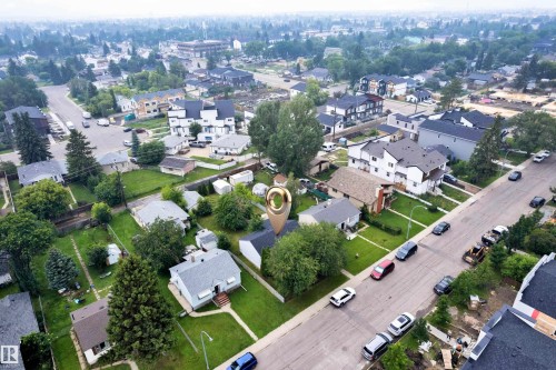 Aerial view of a residential area featuring a collection of single-family homes and multi-story dwellings - 9416 153 Street Nw, Edmonton, AB - Outdoor With View