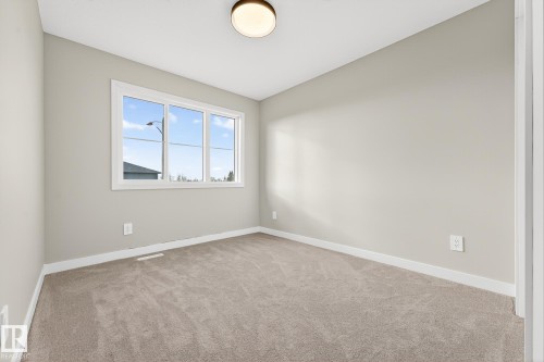 8297 Kiriak Loop Sw, Edmonton, AB - Indoor Photo Showing Other Room