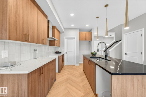 8297 Kiriak Loop Sw, Edmonton, AB - Indoor Photo Showing Kitchen With Upgraded Kitchen