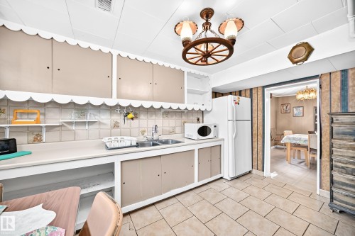 11917 53 Street Nw, Edmonton, AB - Indoor Photo Showing Kitchen With Double Sink