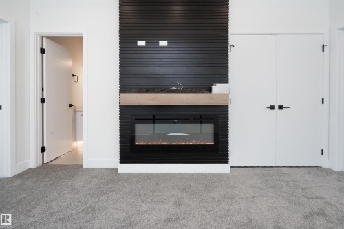 432 Robinson Boulevard, Leduc, AB - Indoor Photo Showing Living Room With Fireplace
