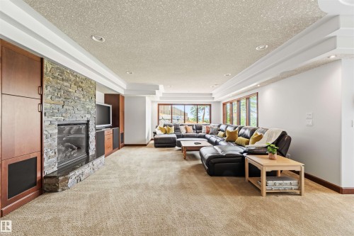 188 Windermere Drive Nw, Edmonton, AB - Indoor Photo Showing Living Room With Fireplace