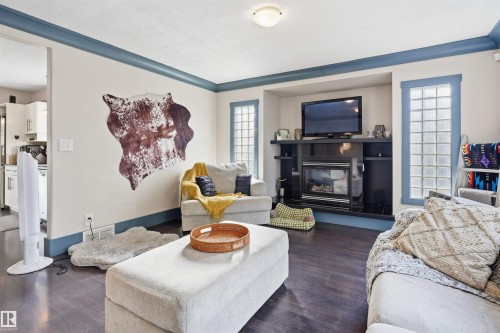 5507 49 Avenue, Wetaskiwin, AB - Indoor Photo Showing Living Room With Fireplace