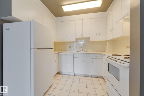 #207 12207 Jasper Av Nw, Edmonton, AB - Indoor Photo Showing Kitchen