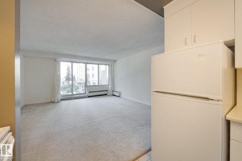 #207 12207 Jasper Av Nw, Edmonton, AB - Indoor Photo Showing Other Room