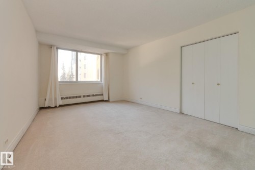 #207 12207 Jasper Av Nw, Edmonton, AB - Indoor Photo Showing Other Room