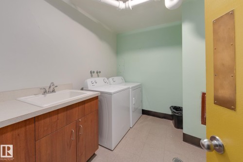 #207 12207 Jasper Av Nw, Edmonton, AB - Indoor Photo Showing Laundry Room