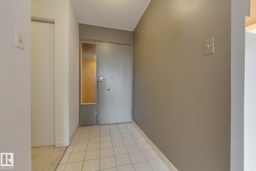 #207 12207 Jasper Av Nw, Edmonton, AB - Indoor Photo Showing Other Room