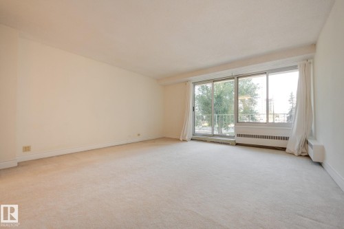 #207 12207 Jasper Av Nw, Edmonton, AB - Indoor Photo Showing Other Room