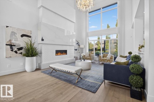1123 Wahl Place Nw, Edmonton, AB - Indoor Photo Showing Living Room With Fireplace