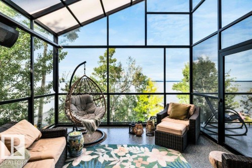 Nestled into the trees, your elevated views of the lake make this a great spot to unwind - 180 Crystal Springs Drive, Rural Wetaskiwin County, AB - Indoor