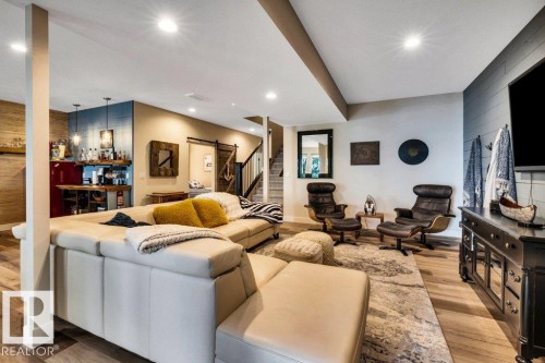 Spacious area featuring a built-in wet bar with shelving - 180 Crystal Springs Drive, Rural Wetaskiwin County, AB - Indoor