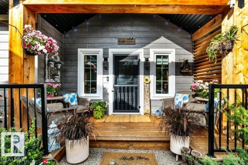 Nothing says Welcome like a cheery covered entrance! - 180 Crystal Springs Drive, Rural Wetaskiwin County, AB - Outdoor