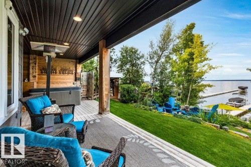 Lower Covered outdoor deck also offers outdoor shower - 180 Crystal Springs Drive, Rural Wetaskiwin County, AB - Outdoor With Deck Patio Veranda With Exterior